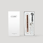 Ease heated eyelash curler with open box showing accessories and USB cable