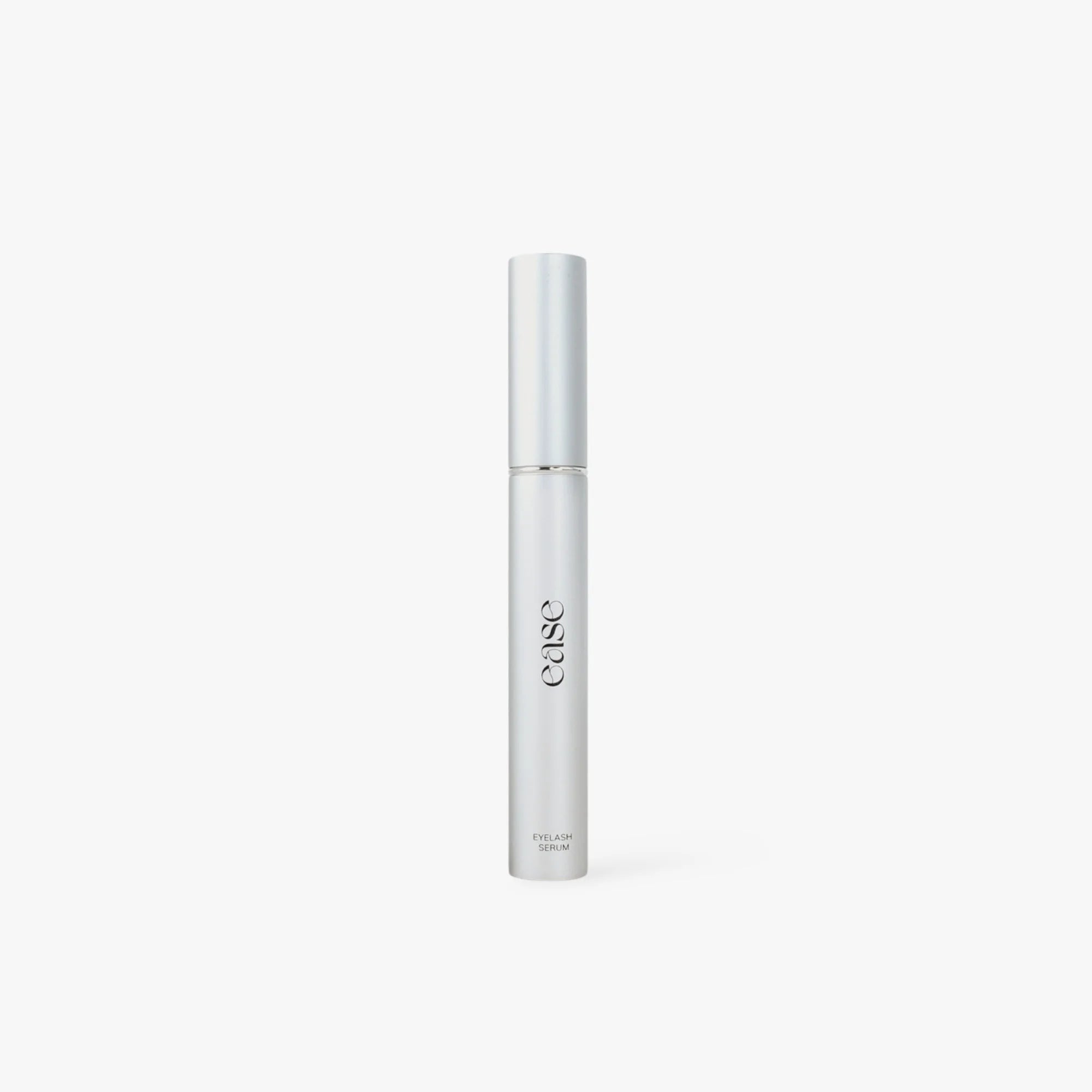 eyelash serum bottle with 'Ease' branding on a light gray background